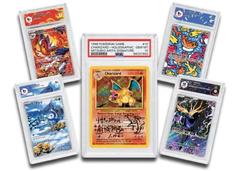 Set di carte Pokémon rare e autografate con Charizard holografico.
