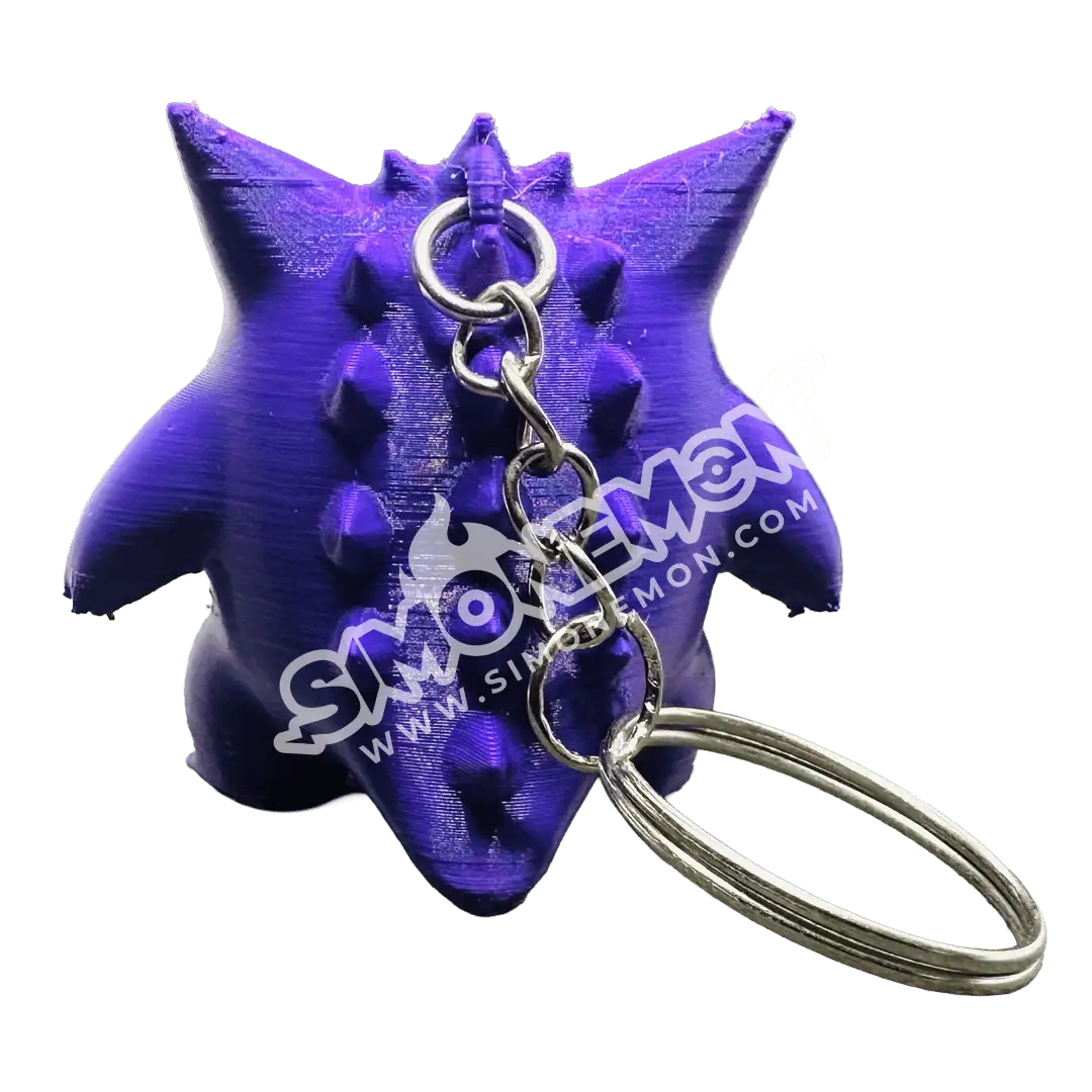 Portachiavi in silicone a forma di drago viola con dettagli.
