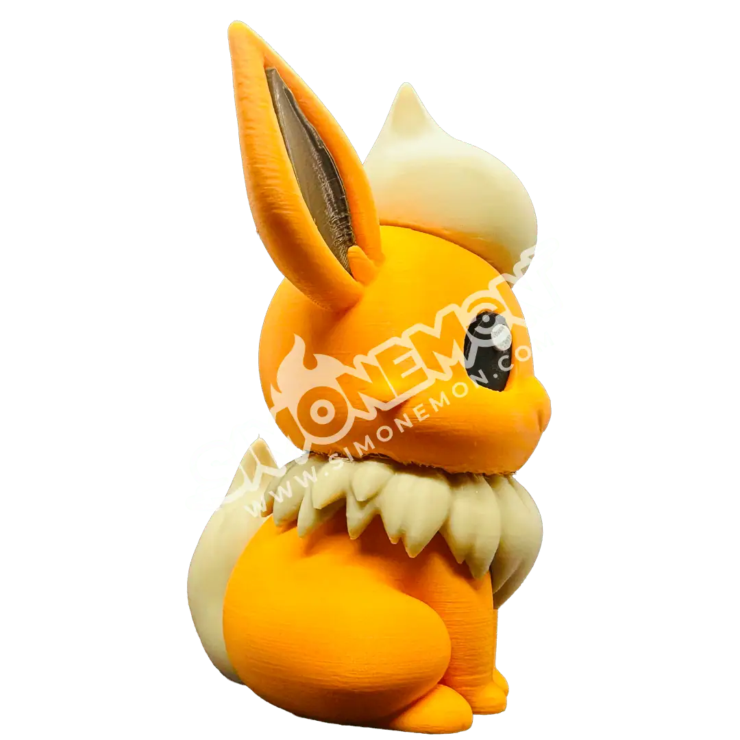 Figura di coniglio in silicone arancione e bianco con dettagli realistici.