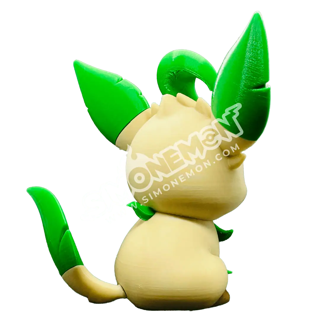 Figurina di Pokémon Leafeon con dettagli verdi e beige.