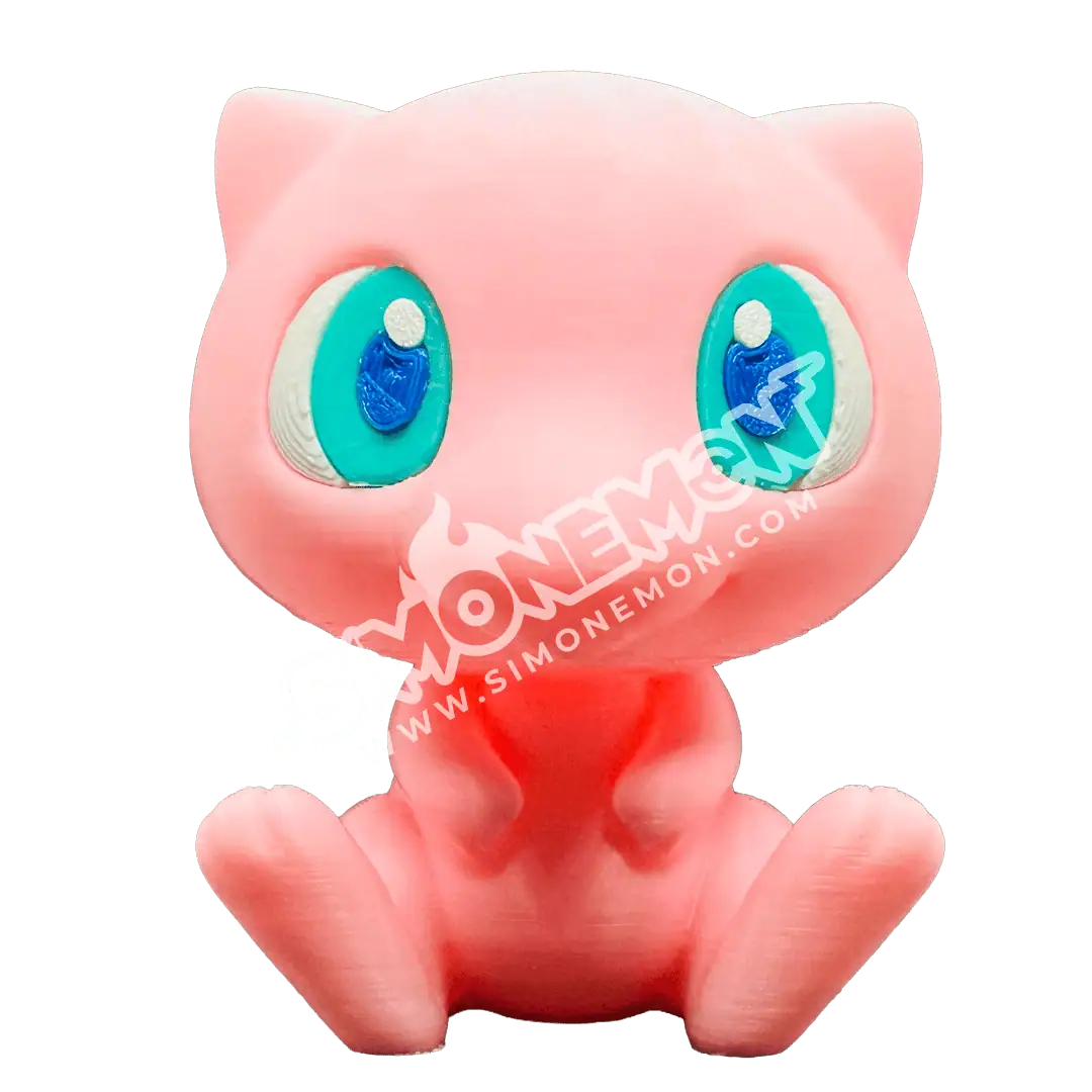 Peluche di gatto rosa con grandi occhi azzurri e dettagli blu.