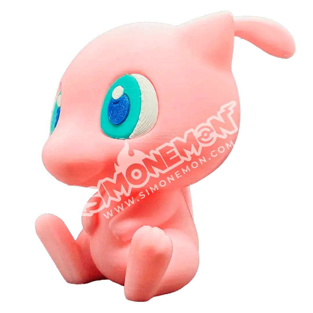 Pupazzo di gatto in silicone rosa con grandi occhi azzurri.
