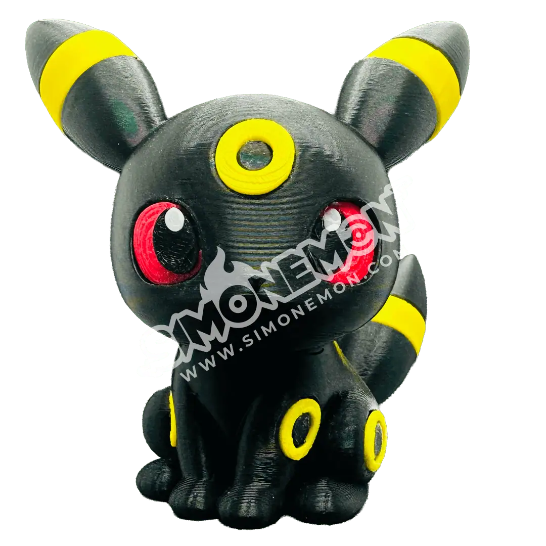 Figura di Umbreon Pokémon in stile collezione con dettagli colorati.
