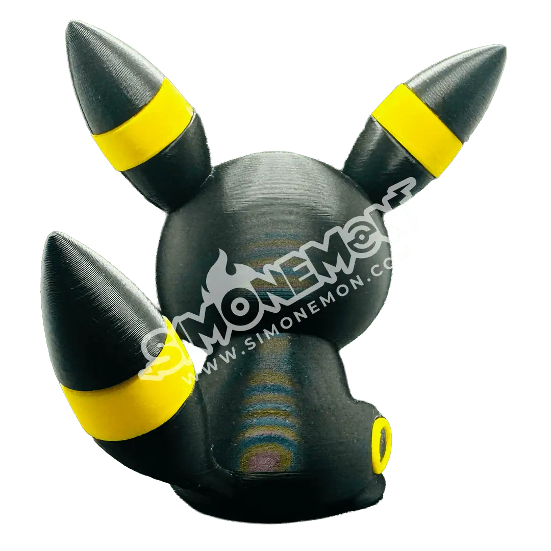 Figura di Umbreon Pokémon in stile collezione con dettagli colorati.