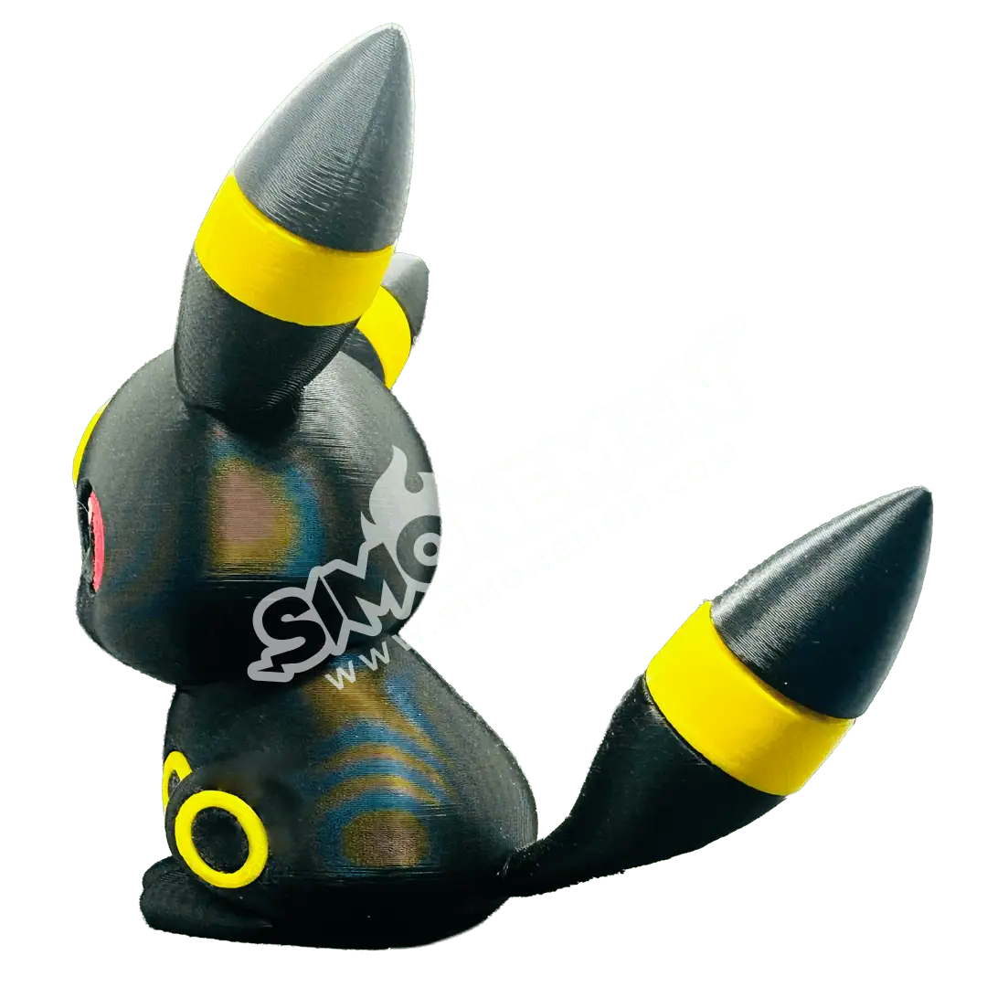 Figura di Umbreon Pokémon in stile collezione con dettagli colorati.