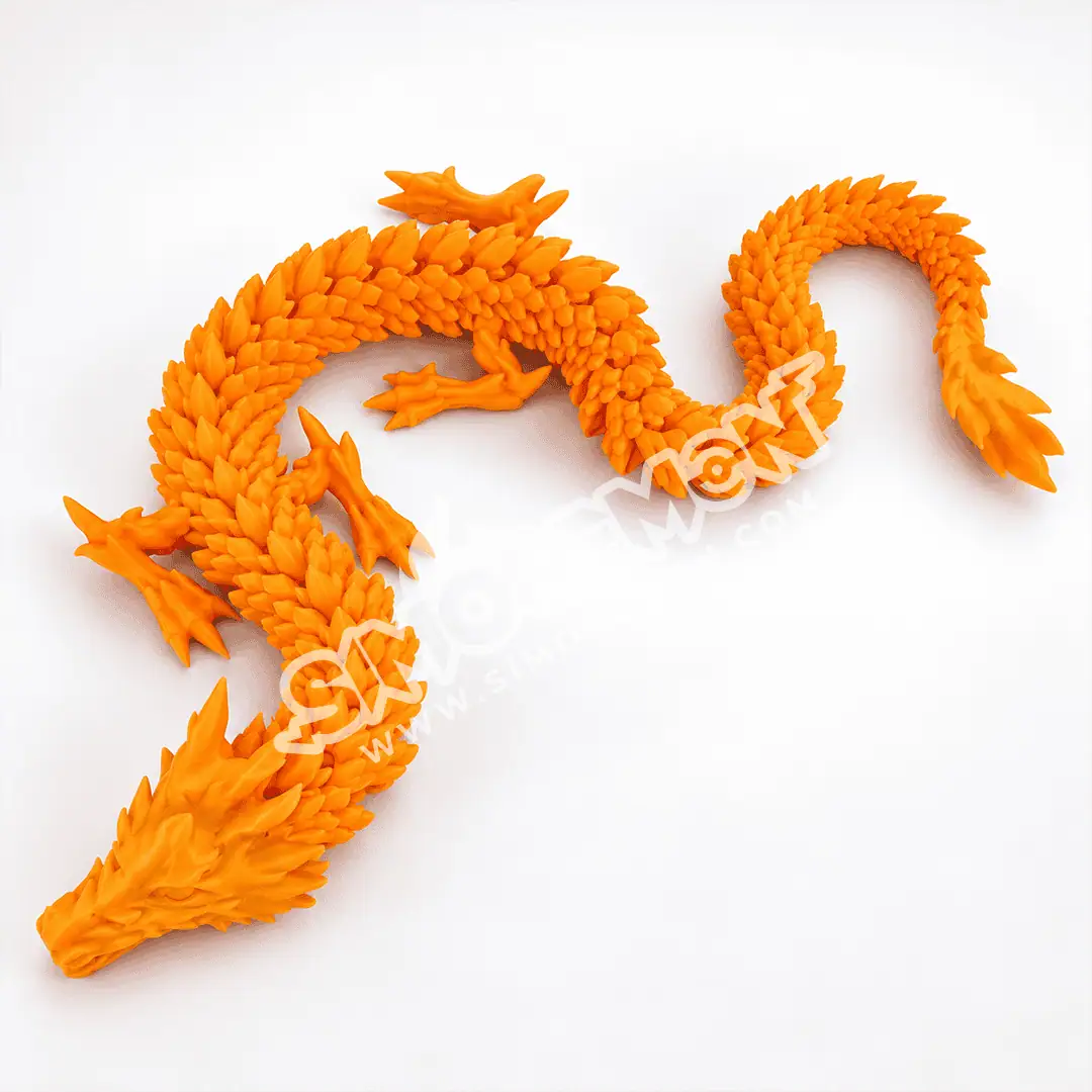 Dragone decorativo in arancione con dettagli dettagliati e scaglie.
