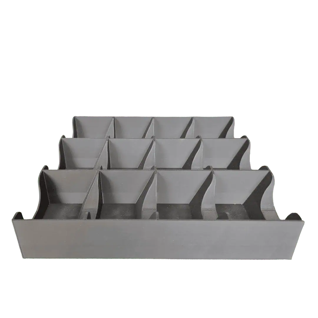 Organizzatore di cassetti in plastica grigia con scomparti multipli.