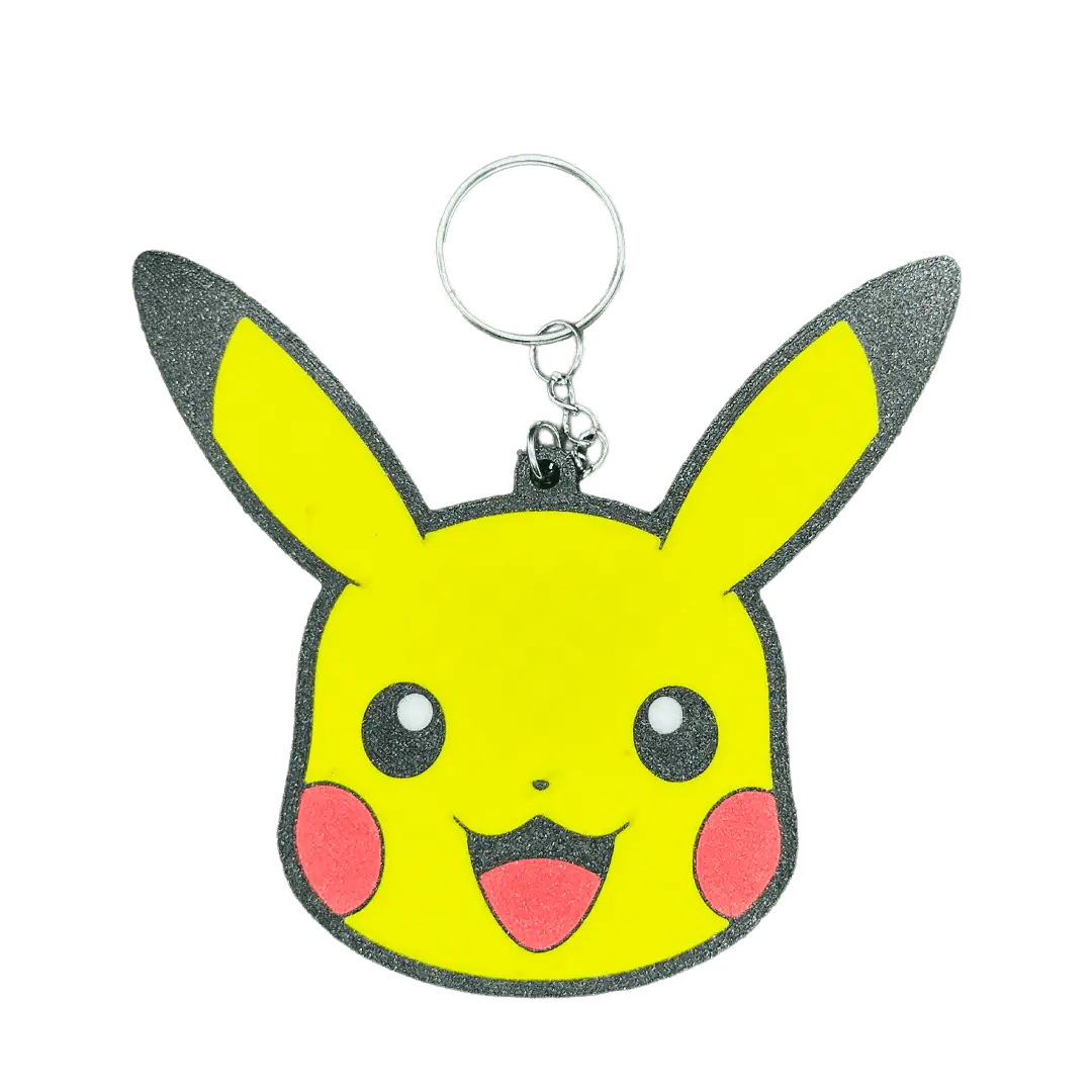 Portachiavi Pikachu in schiuma gialla con orecchie nere e sorriso felice.