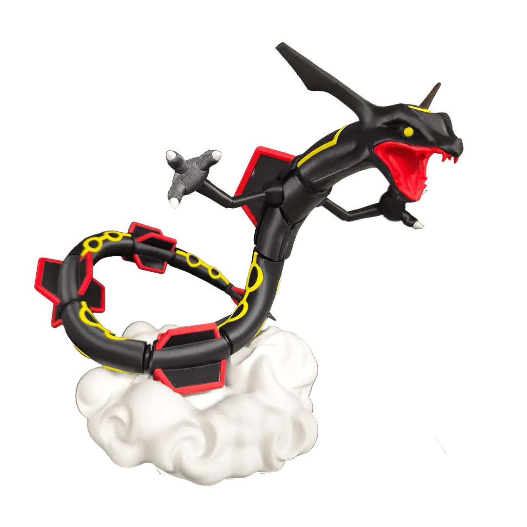 Figura di un Pokémon Dragone in plastica nera e rossa con dettagli gialli, su nuvole di plastica bia.