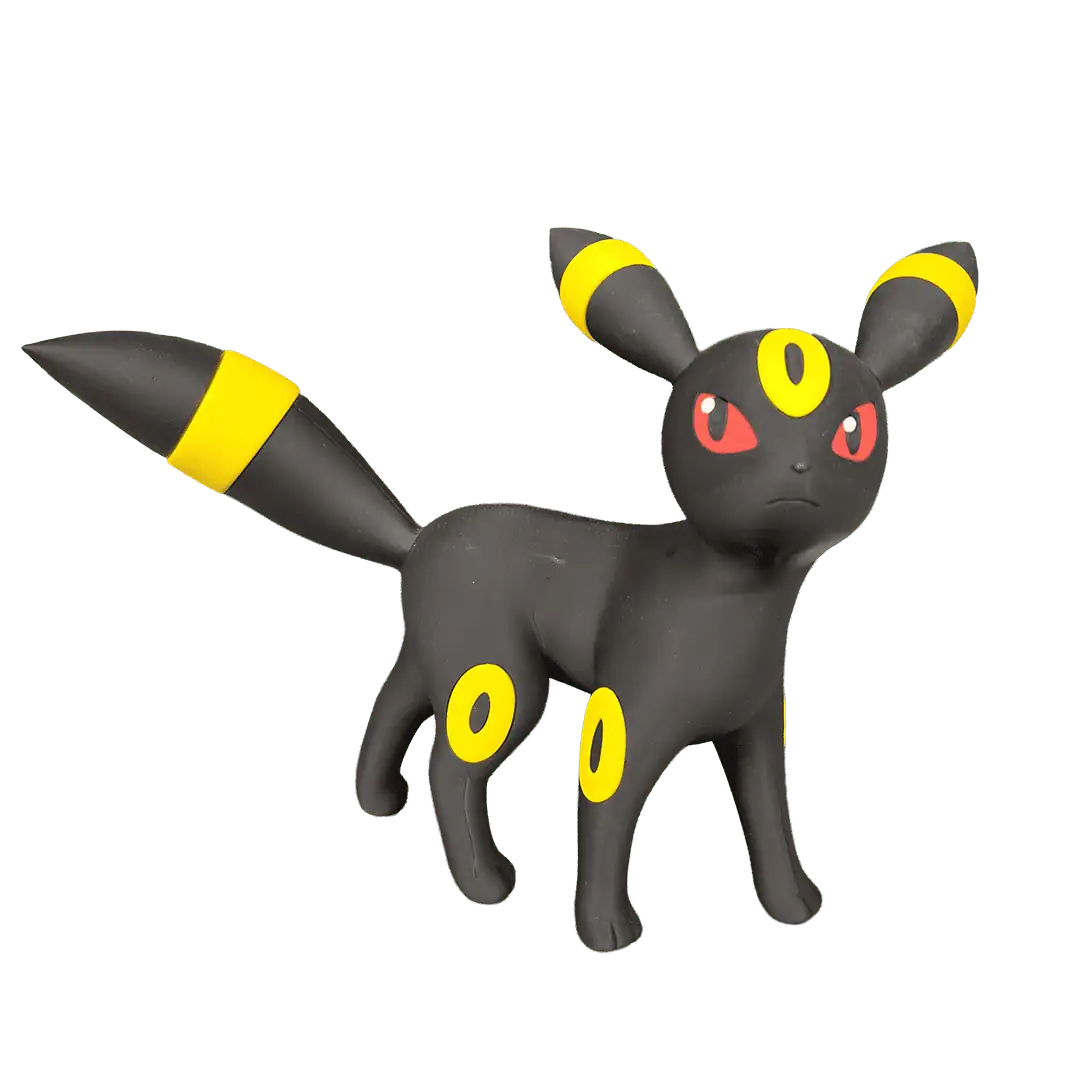 Figura di Pokémon Umbreon in plastica nera e gialla con occhi rossi.