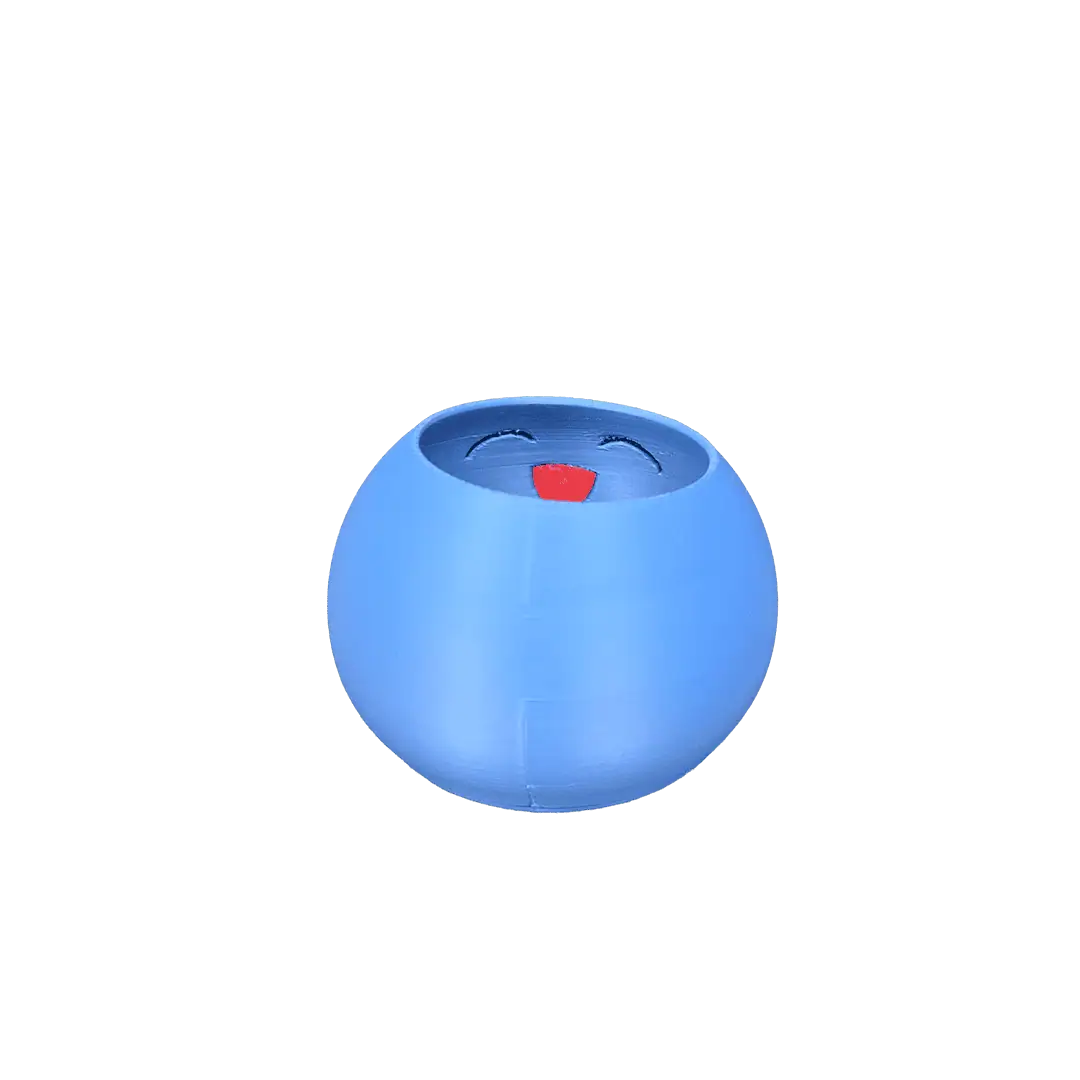 Contenitore blu a forma di faccina sorridente con lingua rossa.